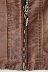 Brown background texture leather stitched stitch and zipper