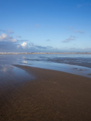 Devon beach scene background with blue sky