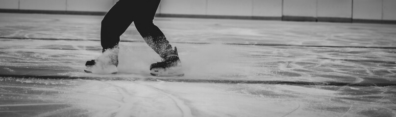 Closeup aggressive ice skating. Copy space