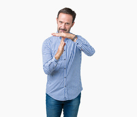 Handsome middle age elegant senior man over isolated background Doing time out gesture with hands,...