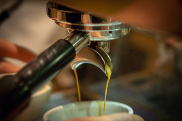Fototapeta na wymiar preparing coffee an espresso