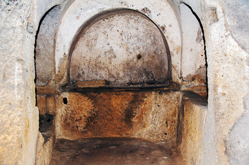 Ancient tombs dug in the tuff rock in the subsoil of Naples (Italy) called catacombs of San Gennaro.
