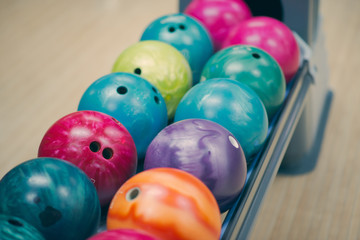 Fototapeta na wymiar Row of bowling balls - top view