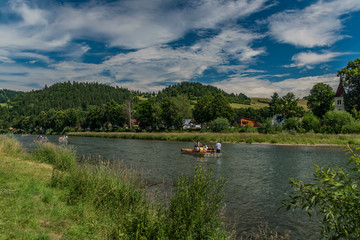 Fototapeta na wymiar Wooden boats in Pieniny near Poland and Slovakia border in Cerveny Klastor town