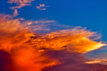 Beautiful sunlit orange clouds