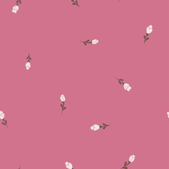 White and green flower buds on pink background seamless vector pattern