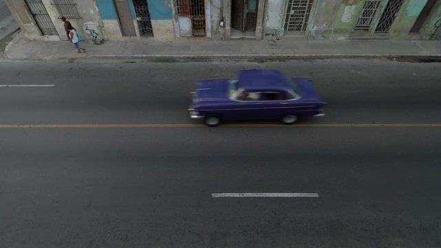 Aerial view on classic american cars driving on Malecon street in Havana, Cuba