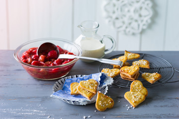 Strawberry compote with heart shaped biscuits
