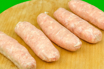 The meat frozen semi-finished for friing sausages
