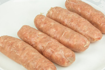 The meat frozen semi-finished for friing sausages