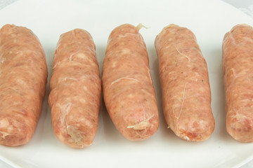 The meat frozen semi-finished for friing sausages