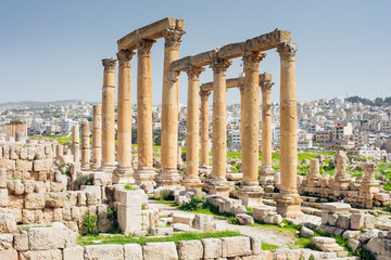 arch in ruins in antique city in Jordan