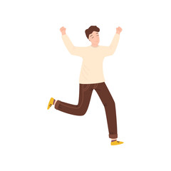 Young beautiful man in fashionable clothes jumping from happiness and fun.