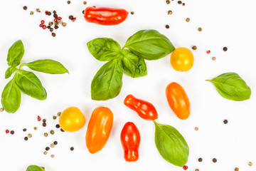 Basil, pepper and cherry tomatoes composition, isolated on white background