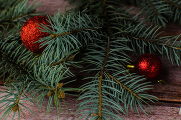 Gift boxes with a large red bow against a background bokeh of twinkling party lights. Luxury New Year gift. Christmas gift. Christmas background with gift box. Christmastime celebration