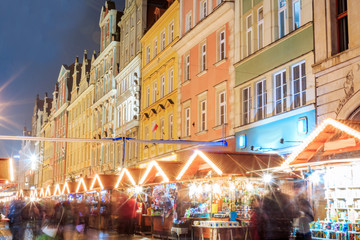 Fototapeta na wymiar Christmas night market place in Wroclaw, Poland