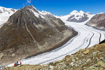 Fiesch, Swizterland: 25 September 2017 - Hikers viewing the Great Aletsch Glacier - largest...