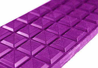 Closed Up Chocolate Bar in Vivid Purple Color Isolated on White Background