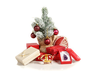Christmas tree gift boxes with toys on a white background