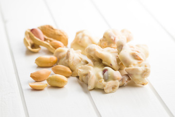 Peanuts covered chocolate.