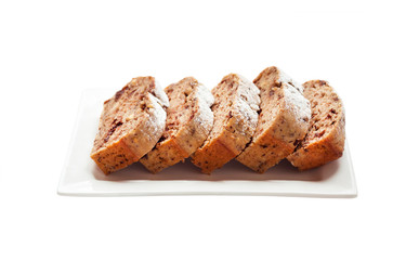 Banana cake with walnuts and dark chocolate isolated with clipping path