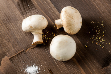 Mushroms isolated on a wooden surface
