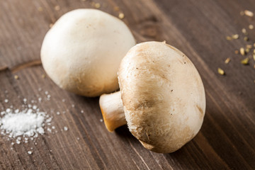Mushroms isolated on a wooden surface
