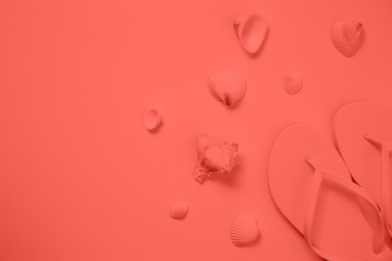 Beach accessories on the white background. Living coral theme - color of the year 2019