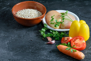 Ingredients for soup on the black background.