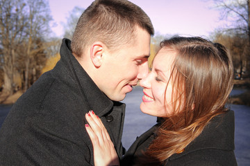 Fototapeta premium Love story of a man and a woman on a bridge on a valentine's day