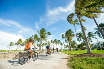Fotobehang Bright scenic morning view of the beachfront promenade in Lummus Park adjacent to historic Ocean Drive in South Beach, Miami, Florida © lazyllama