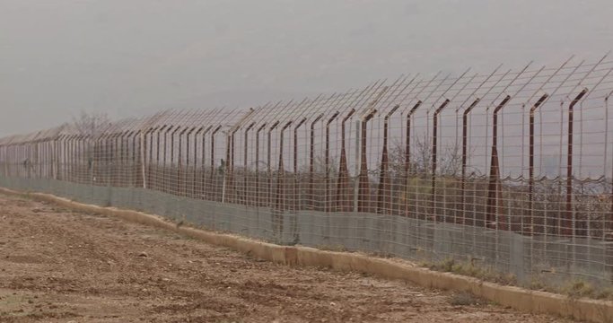 Border fence between Israel and Lebanon. barbed wire and electronic fence.