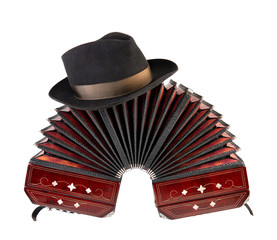 Bandoneon, tango instrument with a male hat on top