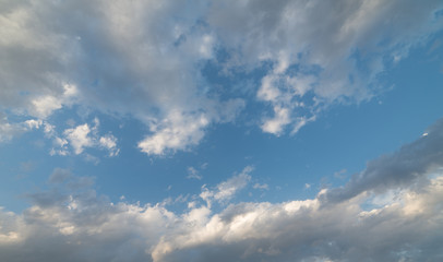 Clear bright blue sky with sunny clouds - perfect for background. Blue, white pastel heaven in soft focus. Simple shot of peaceful and beautiful nature. Opened, minimalist view out of windows. - Image