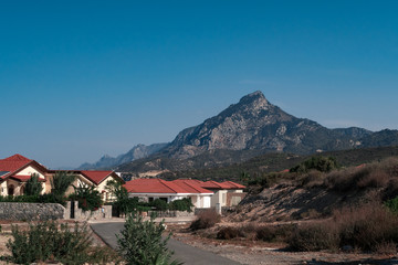 Houses and mountains in the background