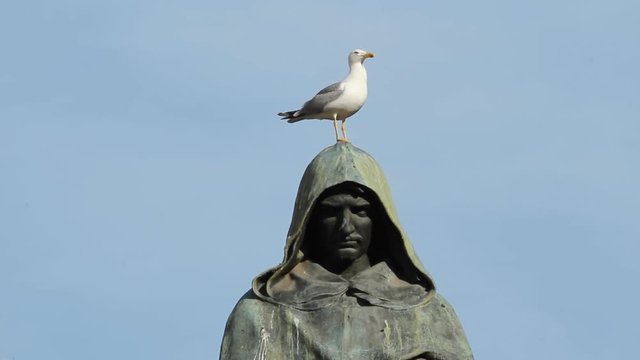 The Statue of Giordano Bruno, created by Ettore Ferrari, was erected at Campo de' Fiori in Rome, Italy, in 1889. 