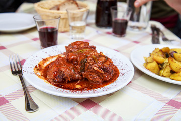 Coda alla vaccinara cooked in Rome in Trastevere
