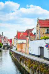 Fototapeta premium Beautiful canal and traditional houses in the old town of Bruges (Brugge), Belgium