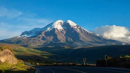 Foto op Aluminium Panoramic view of the Chimborazo volcano in a day with clear blue sky. Chimborazo is the highest mountain in Ecuador with a peak elevation of 6,263 m. It is the highest peak near the equator. © alejomiranda