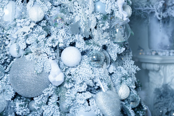 Christmas balls on fir tree. New Year holidays and Christmastime celebration.