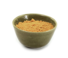 Turmeric, curcuma powder in a bowl isolated on white background. Heap of turmeric.
