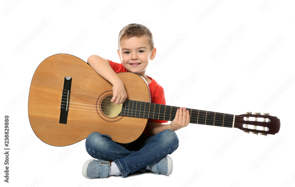 Canvas Prints Little boy with acoustic guitar on white background