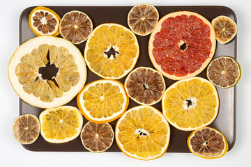 Dried slices of various citrus fruits