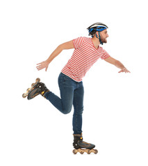 Young man with inline roller skates on white background