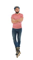 Full length portrait of young man with inline roller skates on white background