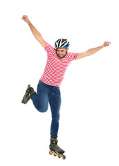 Young man with inline roller skates on white background
