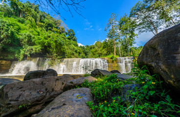 Beautiful waterfall in natural "Si Dit Waterfall" with blue sky in khao kho national park