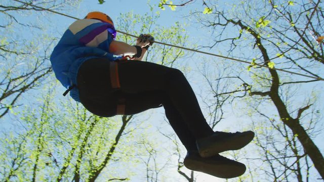 Young man on a zip-line 
