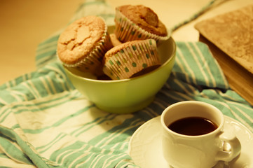 Homemade cupcakes, coffee and a old book