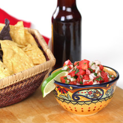Bowl of Salsa and Basket of Chips